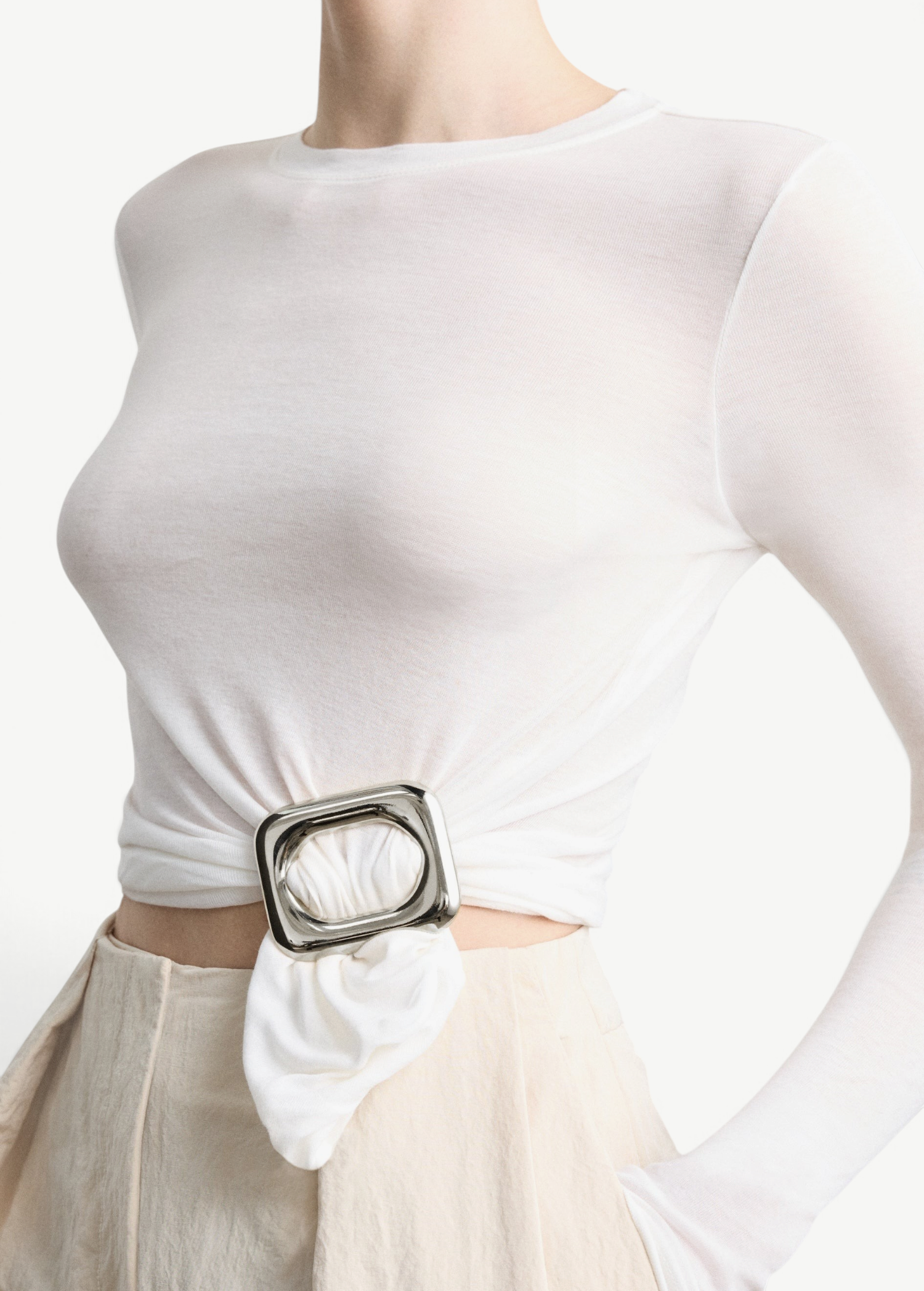 KABE SHOP INC Sculpted Slide, a polished gold square ring cinching a white long-sleeve top for a refined look.