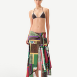 KABE SHOP INC Lumier skirt featuring a multi-colored patchwork print with an asymmetrical hem and draped front