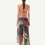 KABE SHOP INC Lumier skirt featuring a multi-colored patchwork print with an asymmetrical hem and draped silhouette.