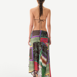 KABE SHOP INC Lumier skirt featuring a multi-colored patchwork print with an asymmetrical hem and draped silhouette.