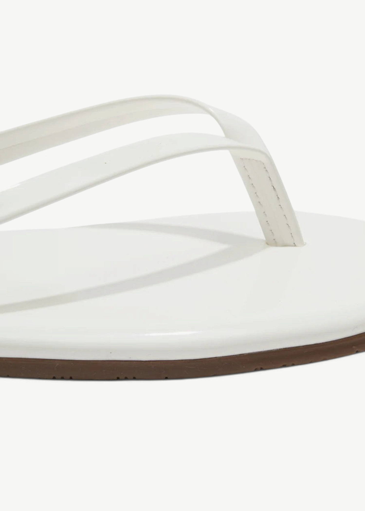KABE SHOP INC Lily Glosses white patent leather flip flop with a cushioned insole and brown rubber outsole