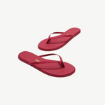 Red flip-flops on a white background