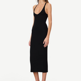 Model wearing a KABE SHOP INC black ribbed V-neck racerback midi dress with a slim fit, styled with black heels.