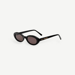 Certainly! Here’s a rewritten version using your product data: The Sylvie sunglasses feature black, oval-shaped frames with dark lenses and bold, thick sides adorned with LU—GOLDIE in gold lettering on the left arm, all showcased against a crisp white background—a true pocket rocket accessory that complements any vintage suit.