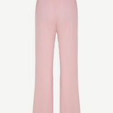 KABE SHOP INC Malaika pants in light pink with a relaxed straight-leg silhouette and textured fabric back view