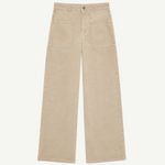 Cold Dye Boyfriend Jeans with Patch Pockets—these beige wide-leg jeans feature front patch pockets, a button and zipper closure, and visible stitching, shown laid flat on a white background.