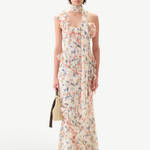 Model wearing KABE SHOP INC Monica floral print maxi dress with ruffle details and a matching detachable scarf