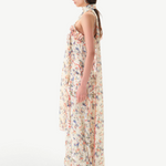 KABE SHOP INC Monica dress in cream floral print with ruffle trim and detachable scarf, side view on a model