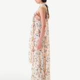 KABE SHOP INC Monica dress in cream floral print with ruffle trim and detachable scarf, side view on a model
