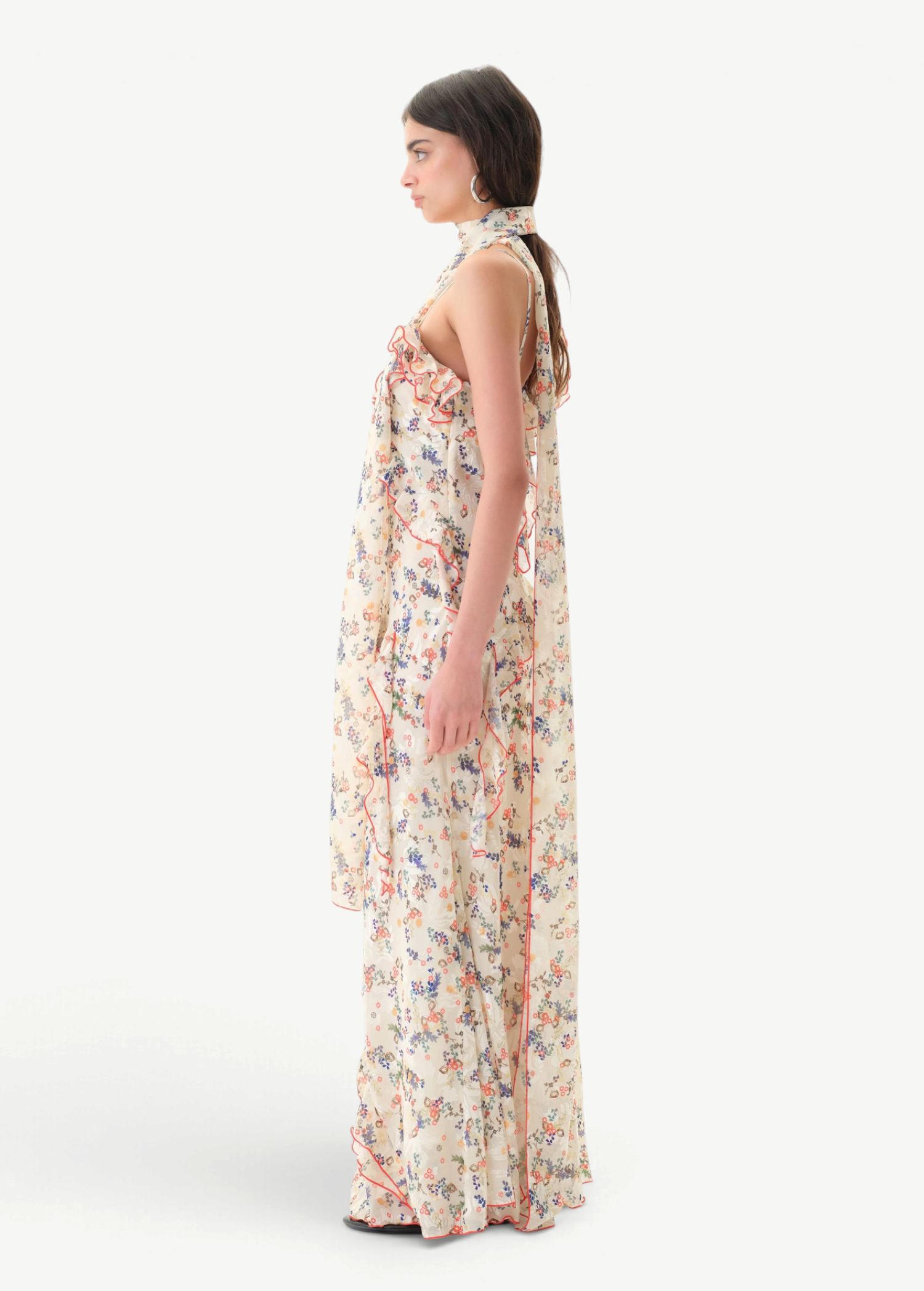 KABE SHOP INC Monica dress in cream floral print with ruffle trim and detachable scarf, side view on a model