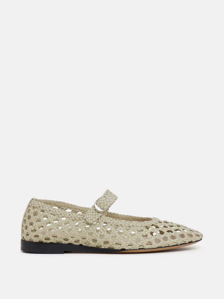 A single beige Mary Jane Woven Leather Shoe is displayed facing left on a plain white background, featuring a handwoven goatskin upper, pointed toe, low black heel, and an instep strap with buckle fastening.
