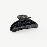 KABE SHOP INC Midi Heirloom hair claw in black and white marble Italian acetate with reinforced metal hardware.
