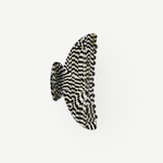 KABE SHOP INC Midi Heirloom hair claw in a black and white checkered Italian acetate with reinforced hardware.