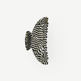 KABE SHOP INC Midi Heirloom hair claw in a black and white checkered Italian acetate with reinforced hardware.