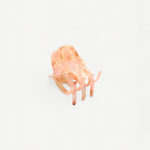 KABE SHOP INC mini claw hair clip in a translucent pink marbled Italian bio-acetate finish