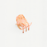 KABE SHOP INC mini claw hair clip in a translucent pink marbled Italian bio-acetate finish