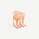 KABE SHOP INC mini claw hair clip in a translucent blush pink bio-acetate with a marbled finish