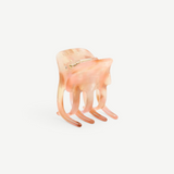 KABE SHOP INC mini claw hair clip in a translucent blush pink bio-acetate with a marbled finish