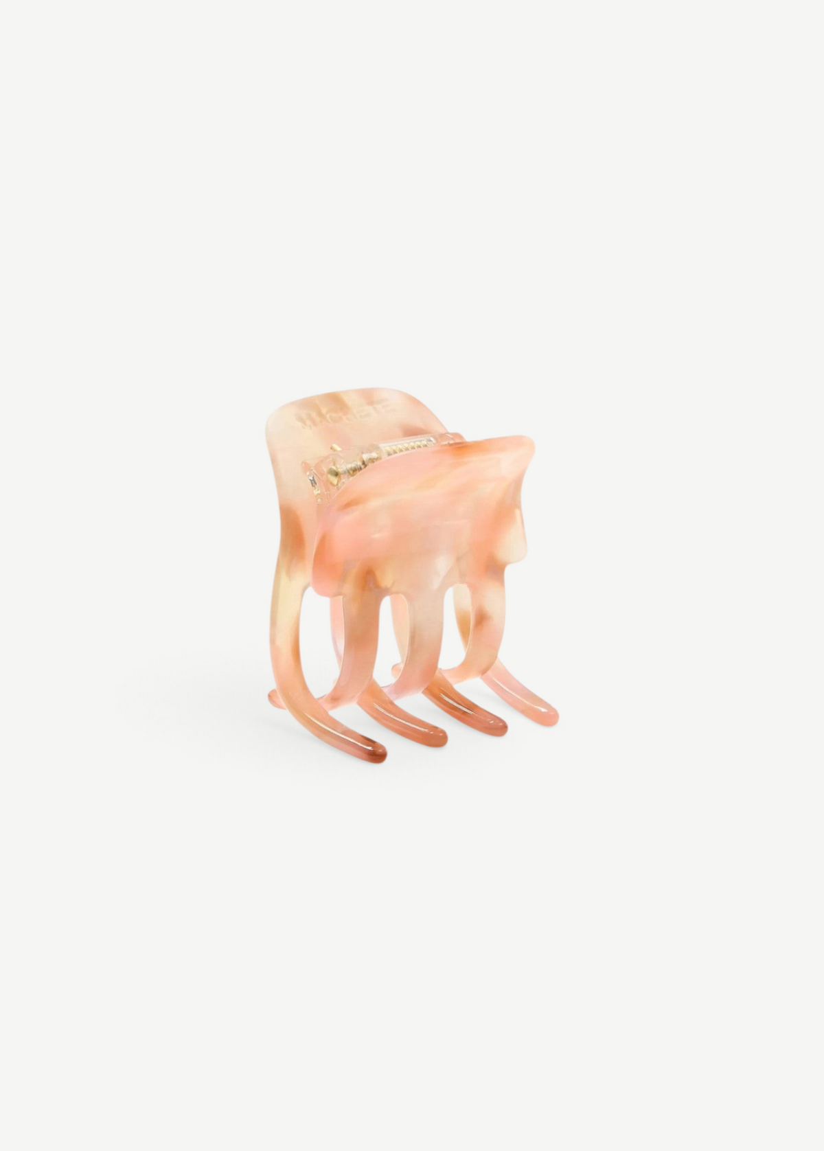 KABE SHOP INC mini claw hair clip in a translucent blush pink bio-acetate with a marbled finish