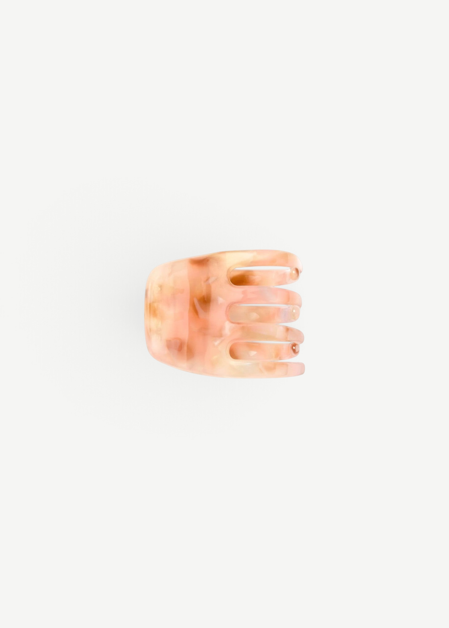 KABE SHOP INC handcrafted mini claw hair clip in a translucent peach and cream marbled Italian bio-acetate finish.