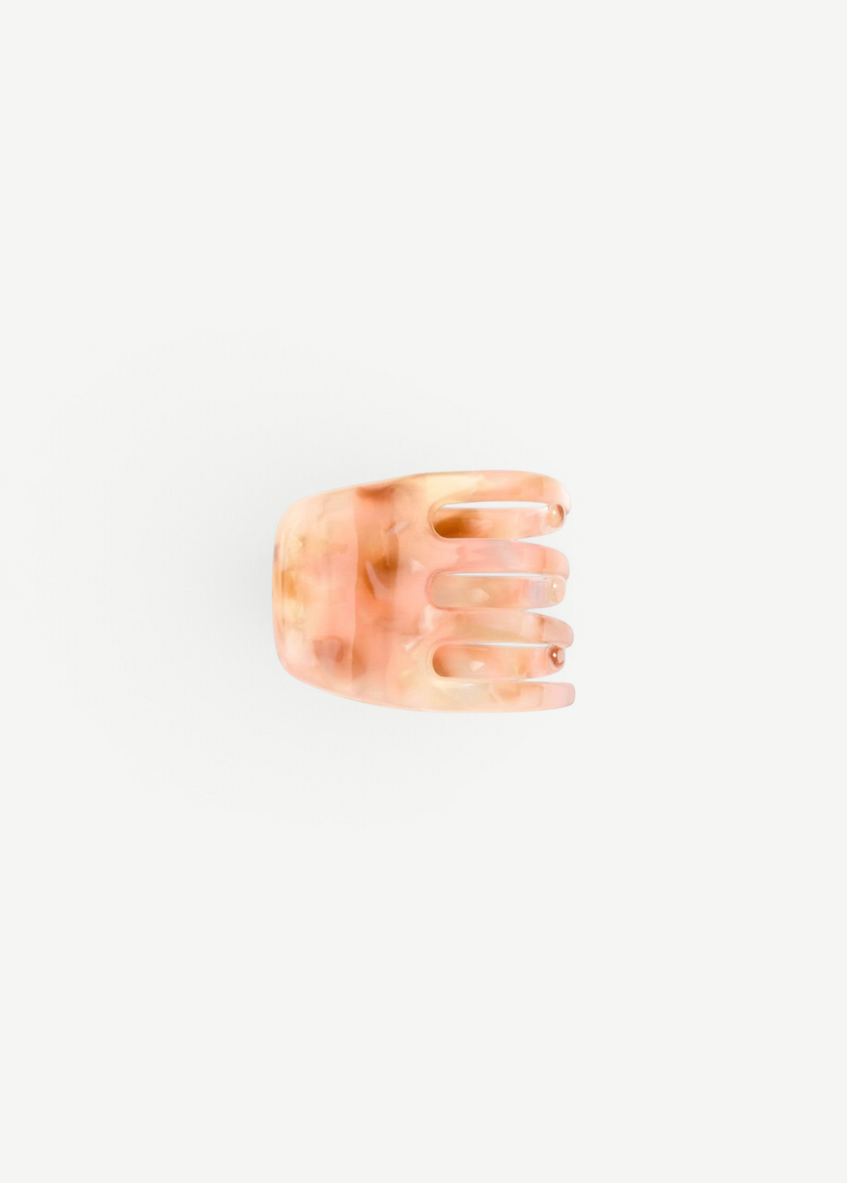 KABE SHOP INC handcrafted mini claw hair clip in a translucent peach and cream marbled Italian bio-acetate finish.