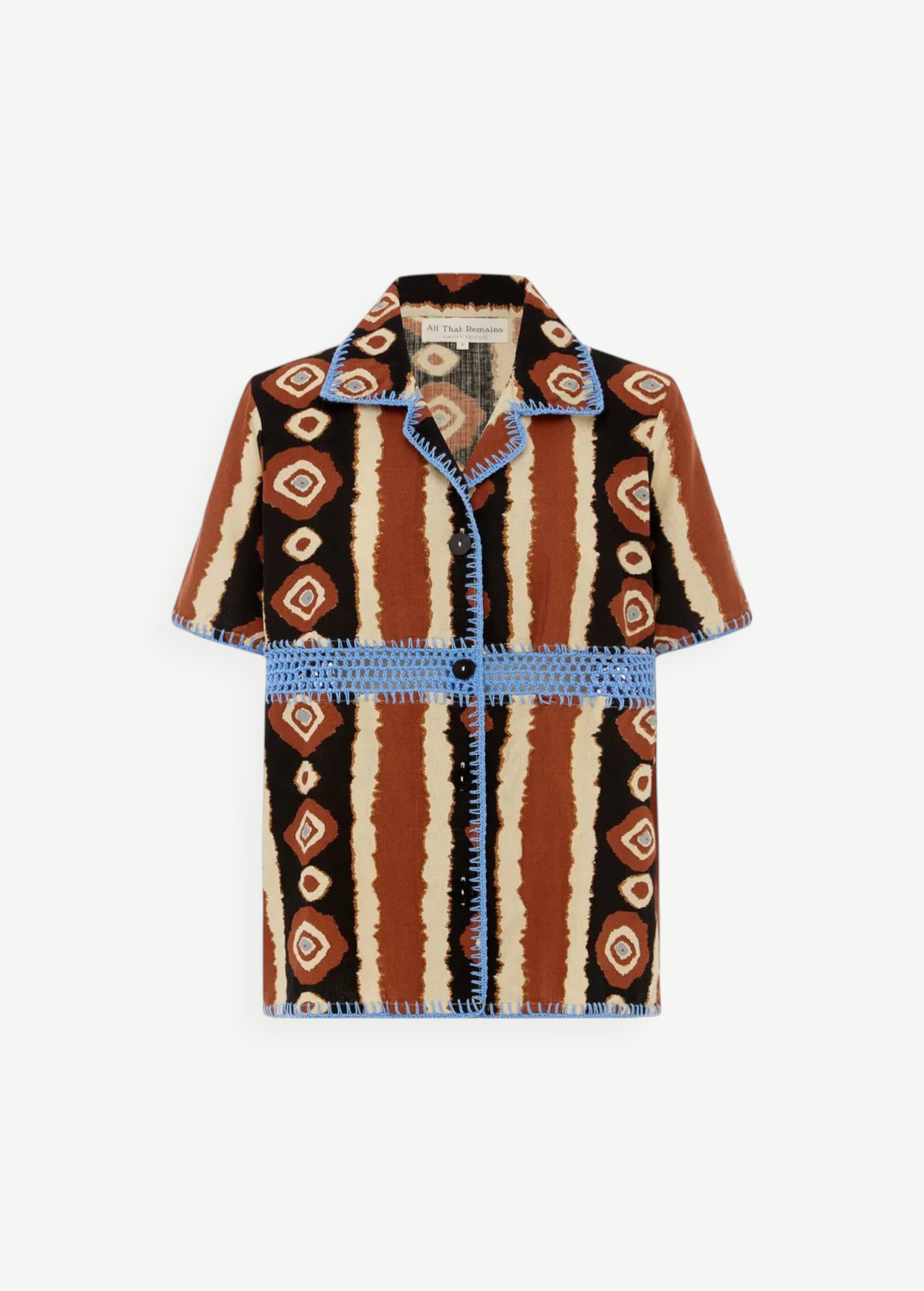 KABE SHOP INC Nera shirt featuring a brown and cream ikat print with contrasting blue crochet trim and button front.