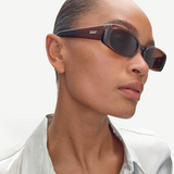 KABE Billy rectangular sunglasses in brown acetate worn by a model in a white shirt