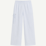 Light blue Deiji Studios Eyelet Pant featuring a wide-leg silhouette, an elastic waist, and side lace-up detail.