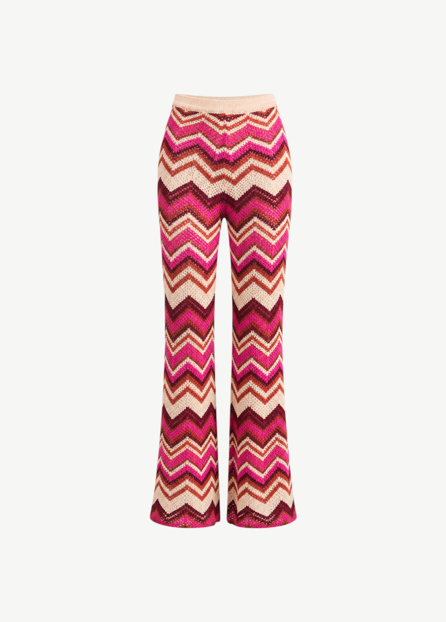 KABE SHOP INC Cierra knit pants featuring a vibrant pink, red, and cream chevron pattern with an elastic waistband.