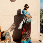 Model wearing KABE SHOP INC Jupe Chantal bohemian skirt with traditional Indian sari-inspired patterns and fringe