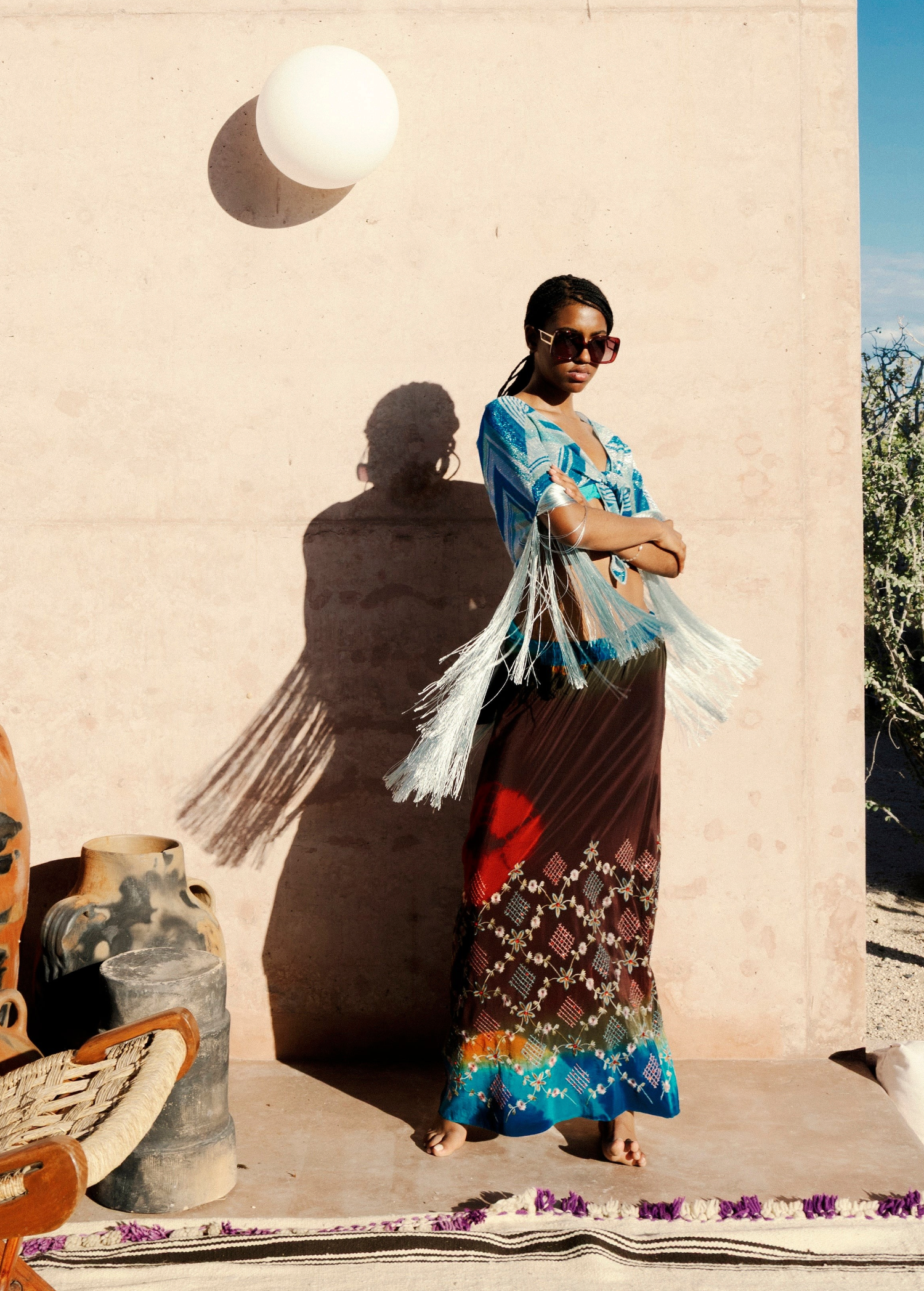 Model wearing KABE SHOP INC Jupe Chantal bohemian skirt with traditional Indian sari-inspired patterns and fringe