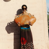 KABE SHOP INC Jupe Chantal bohemian maxi skirt with vibrant tie-dye patterns and intricate embroidery on a model