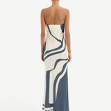 Back view of KABE SHOP INC Lilou strapless midi dress in silk with a blue and cream abstract print