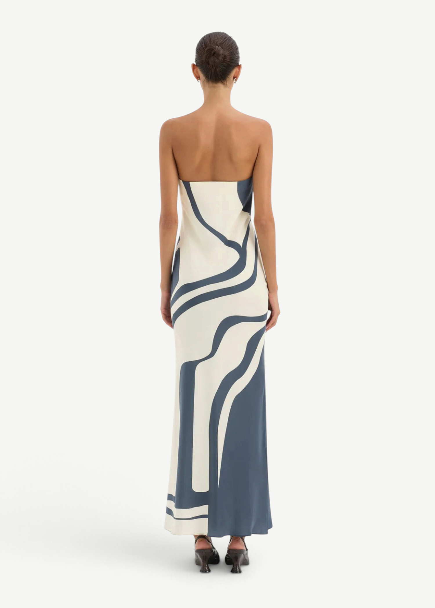 Back view of KABE SHOP INC Lilou strapless midi dress in silk with a blue and cream abstract print