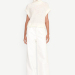 KABE SHOP INC Grayson white wide-leg pants worn by a model with a cream turtleneck sweater