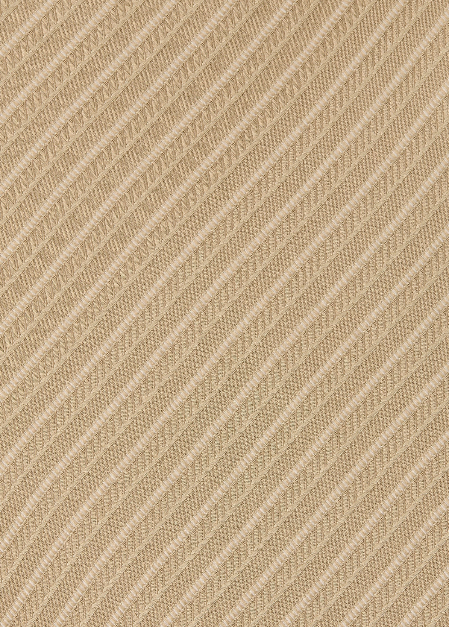 Close-up of the tan Selan Top featuring a repeating diagonal pinstripe pattern woven into the fabric texture.