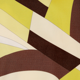 Kortez Balloon Pant featuring an abstract geometric pattern of overlapping angular shapes and curves in shades of brown, cream, and lime green.