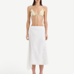 KABE SHOP INC Klara midi skirt in white cotton anglaise with floral cut-out embroidery and an asymmetric wrap hem.