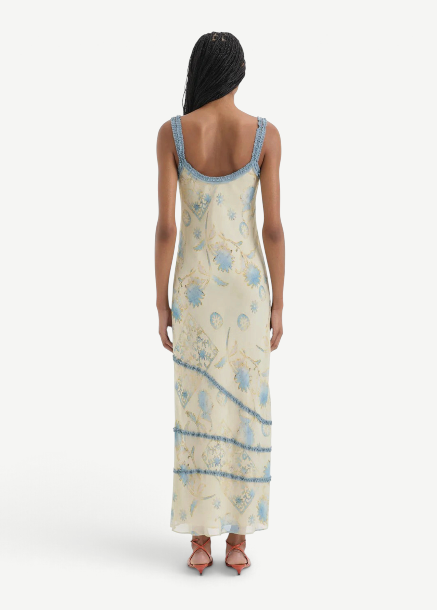 KABE SHOP INC Cecile maxi slip dress in cream with blue floral print, featuring delicate ruffled trim and straps.