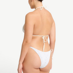 KABE SHOP INC Vista Brief in white with adjustable side ties and delicate beaded details, worn by a model, back view.