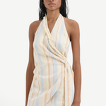 KABE SHOP INC Pernille wrap halter mini dress in striped linen-viscose with frayed edges on a model
