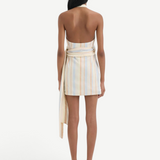 Back view of KABE SHOP INC Pernille wrap halter mini dress in striped linen-viscose with an exaggerated waist tie.