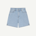 The Lola Shorts are light blue denim high-waisted shorts featuring a classic five-pocket design, belt loops, and a button and zipper closure, displayed on a plain white background.