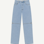 Cowgirl Jeans in light blue denim feature a straight-leg fit, custom hardware, and horizontal zippers at the knees that allow you to detach the lower legs—instantly transforming them into versatile shorts ideal for both horseback riding and everyday wear.