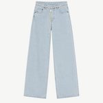 Cool Jeans in light blue boast a relaxed, wide-leg silhouette and are crafted from the softest denim. They feature a comfortable drawstring waistband, classic five-pocket styling, and are displayed flat on a white background.