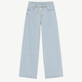 Cool Jeans in light blue boast a relaxed, wide-leg silhouette and are crafted from the softest denim. They feature a comfortable drawstring waistband, classic five-pocket styling, and are displayed flat on a white background.