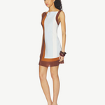 Model wearing KABE SHOP INC Marais mini dress in silk chiffon with brown and white color-block geometric design