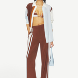 KABE SHOP INC Marais shirt in lightweight silk with a fluid button-front design, worn over a matching bikini top.