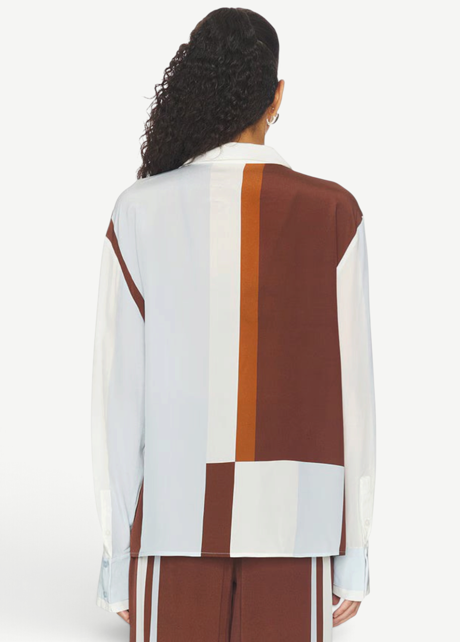 Back view of KABE SHOP INC Marais silk shirt featuring a geometric color-block pattern in white, light blue, and brown.