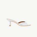 Metallic silver Brigitte Heel mule with a refined silhouette and kitten heel.